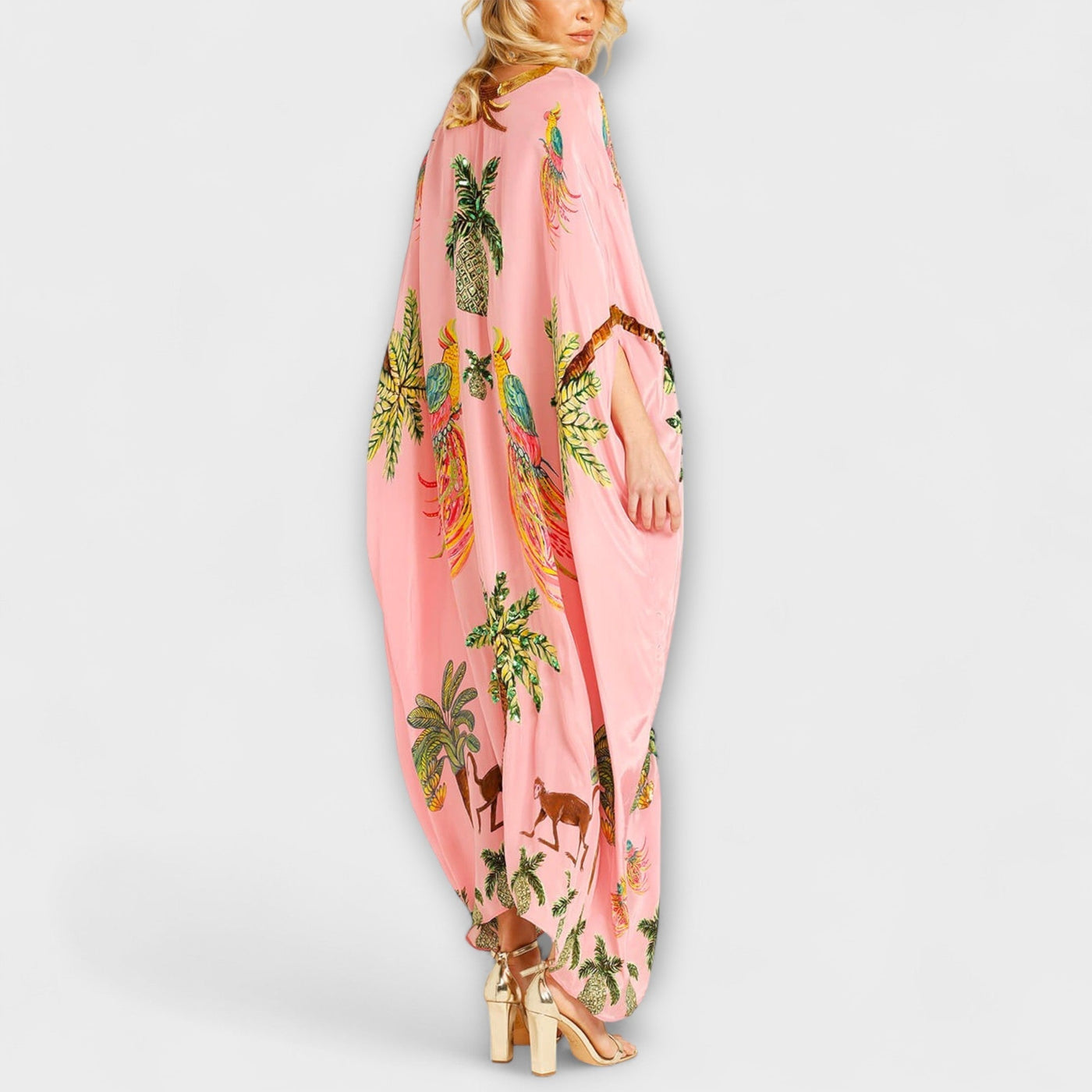 Linda - Vestido llamativo con hombros asimétricos y estampado de palmera